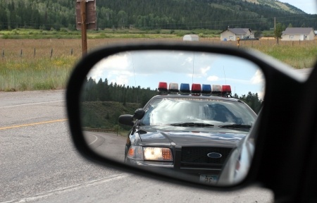 police car in mirror